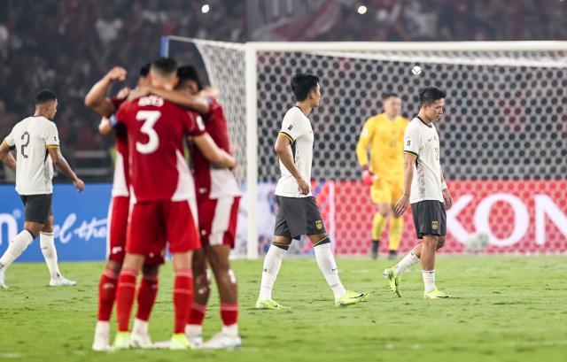 1749141621863089412.jpg (体育)(16)足球——世预赛:中国队不敌印尼队XxjpseC007012_20250606_PEPFN0A001.jpg